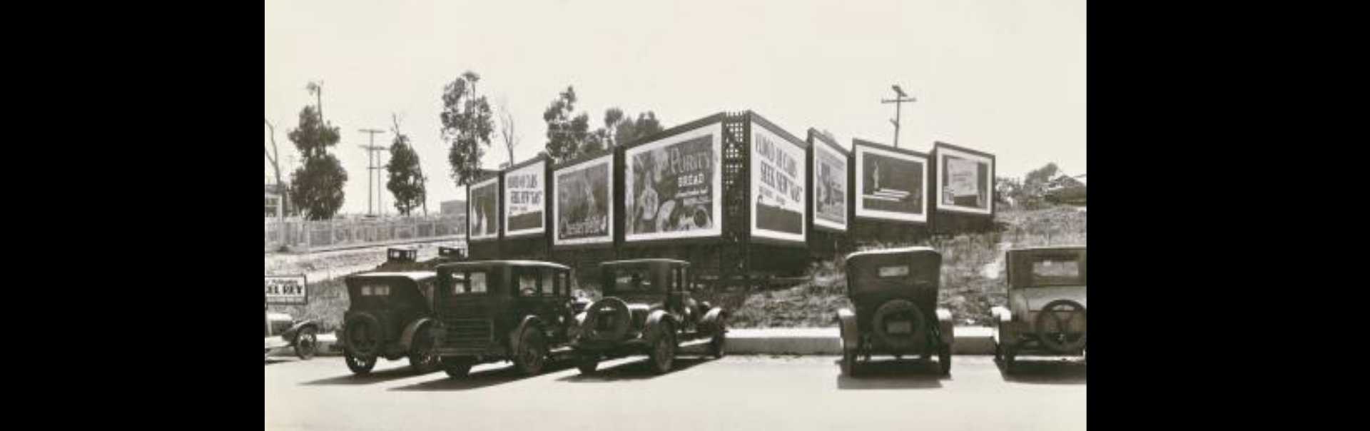 Billboards and Cars at the Corner of Main Street and El Segundo Boulevard 1935